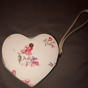 Lauren Conrad floral wristlet never been used.